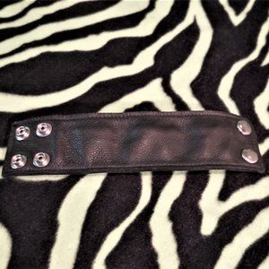 Vintage leather wrist cuff with inside zipper pocket